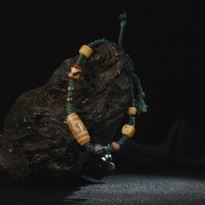 Antique 2-Eye Dzi Bead Bracelet: Handwoven Tibetan Amulet