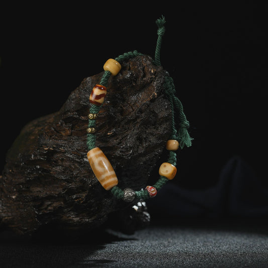 Antique 2-Eye Dzi Bead Bracelet: Handwoven Tibetan Amulet