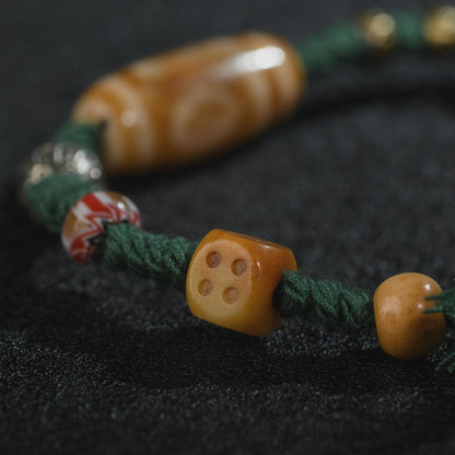 Antique 2-Eye Dzi Bead Bracelet: Handwoven Tibetan Amulet