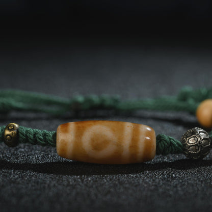 Antique 2-Eye Dzi Bead Bracelet: Handwoven Tibetan Amulet