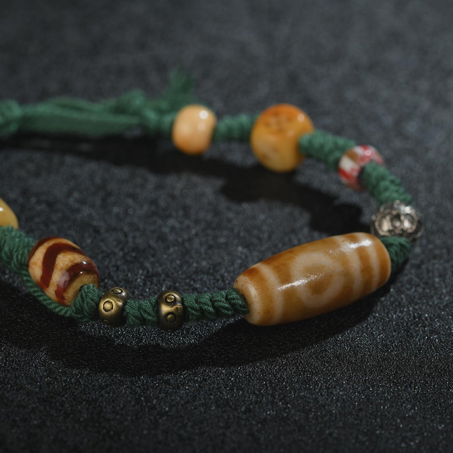 Antique 2-Eye Dzi Bead Bracelet: Handwoven Tibetan Amulet