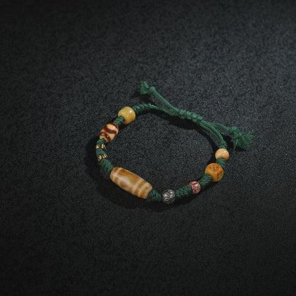 Antique 2-Eye Dzi Bead Bracelet: Handwoven Tibetan Amulet